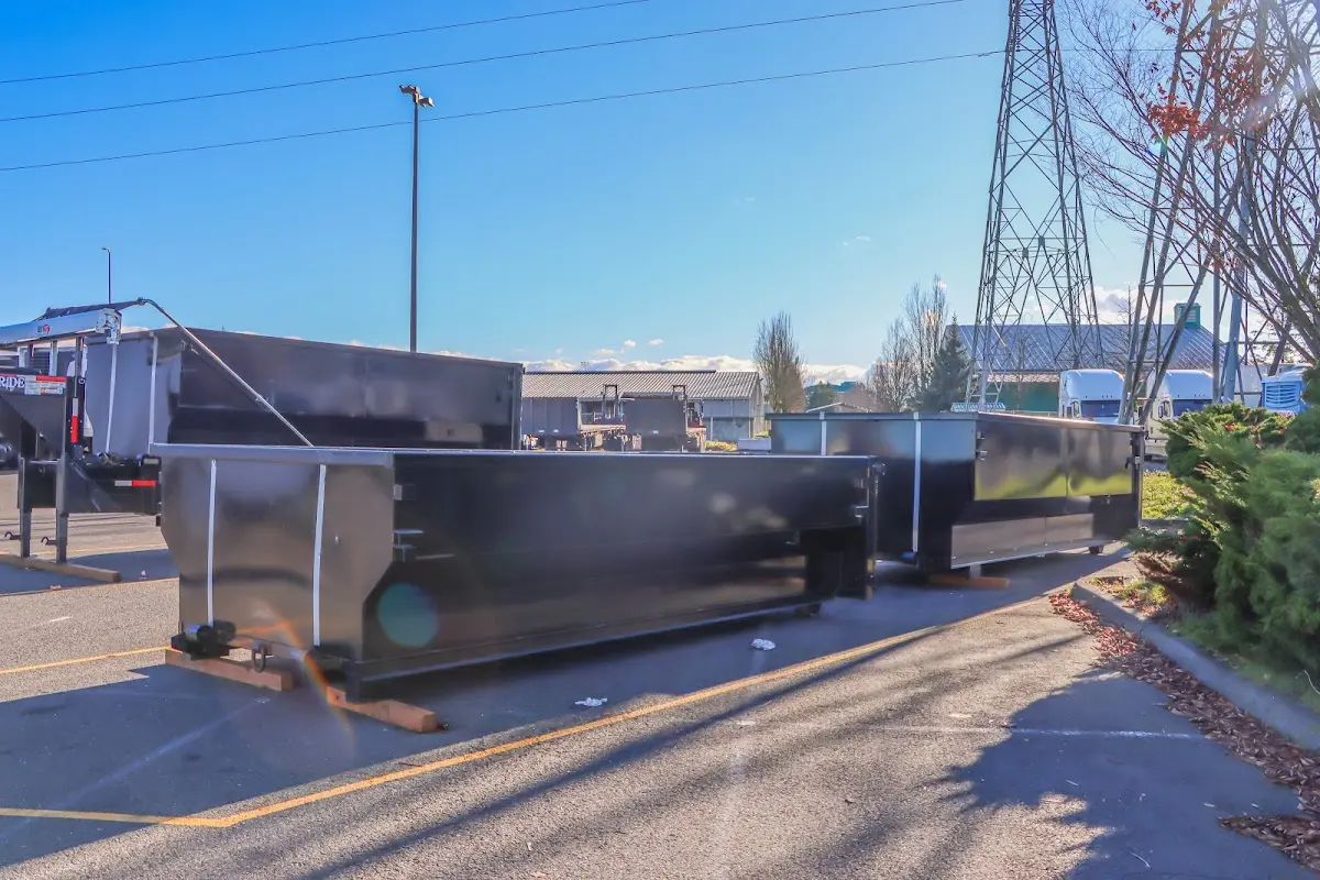 Roll-off dumpster ready for waste disposal at job site for 2 Yard Dumpster Rental in Columbine